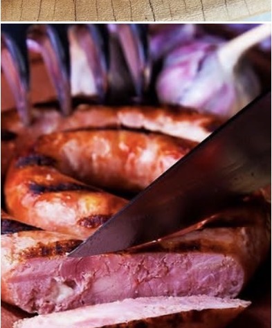 Linguiça artesanal Schetini sendo cortada